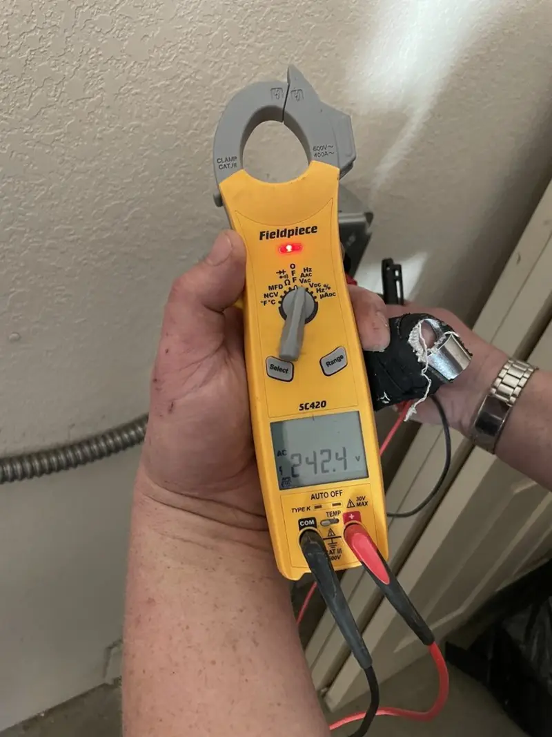 Voltage testing with clamp meter during Generator Installation in Duquesne